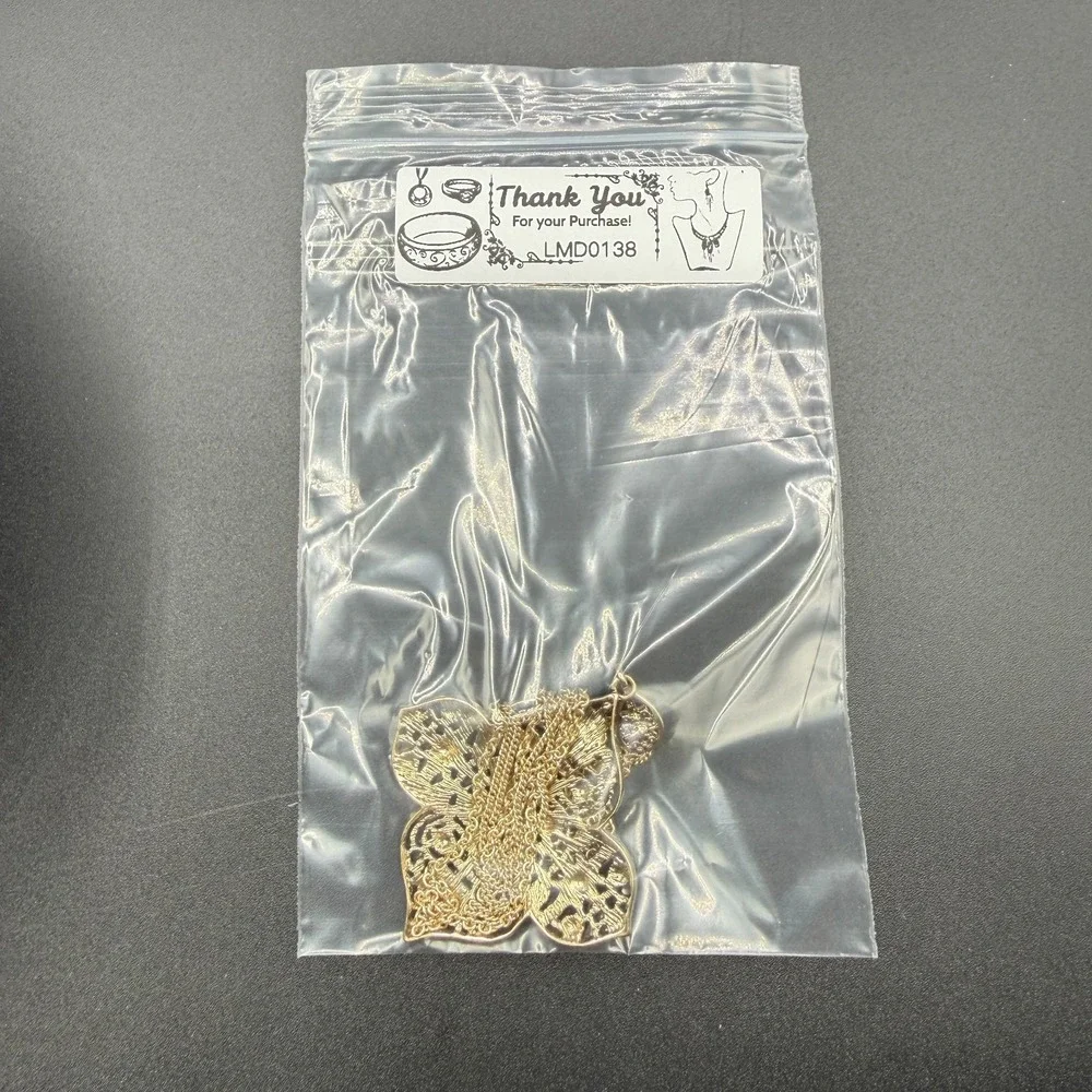 Charming Charlie ornate gold